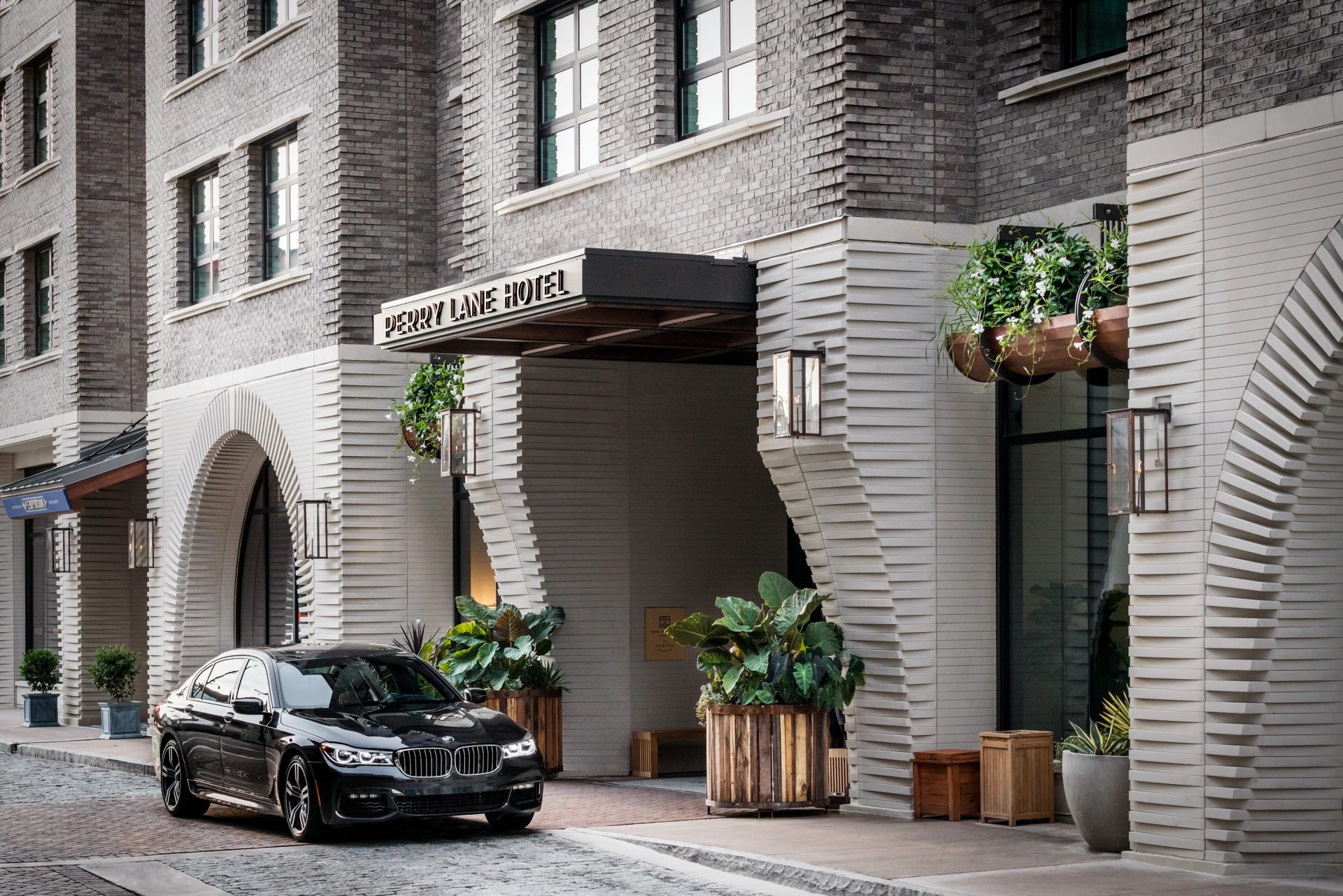 Entrance of The Perry Lane, a Luxury Collection Hotel overseen by hospitality operations firm, hotelAVE